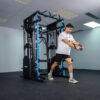ejercicio cruce de poleas rack smith 900